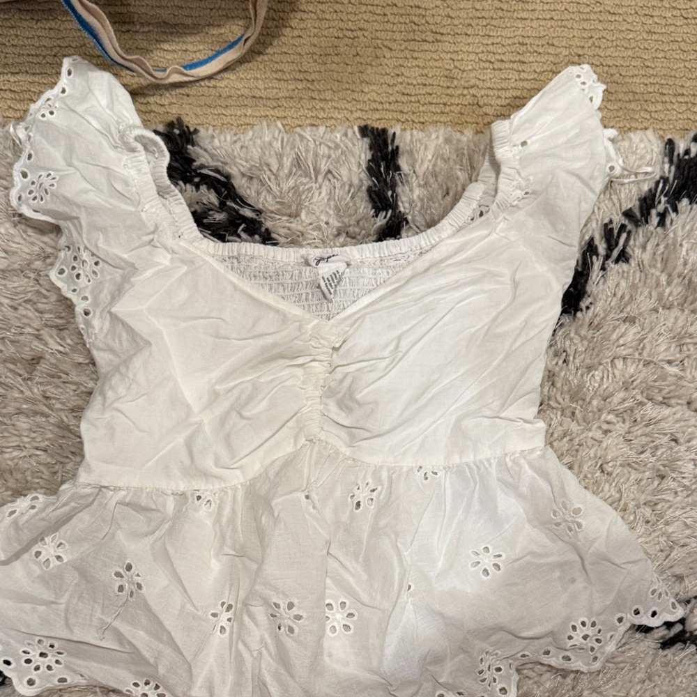 Elegant White Eyelet Blouse with Ruffle Sleeves